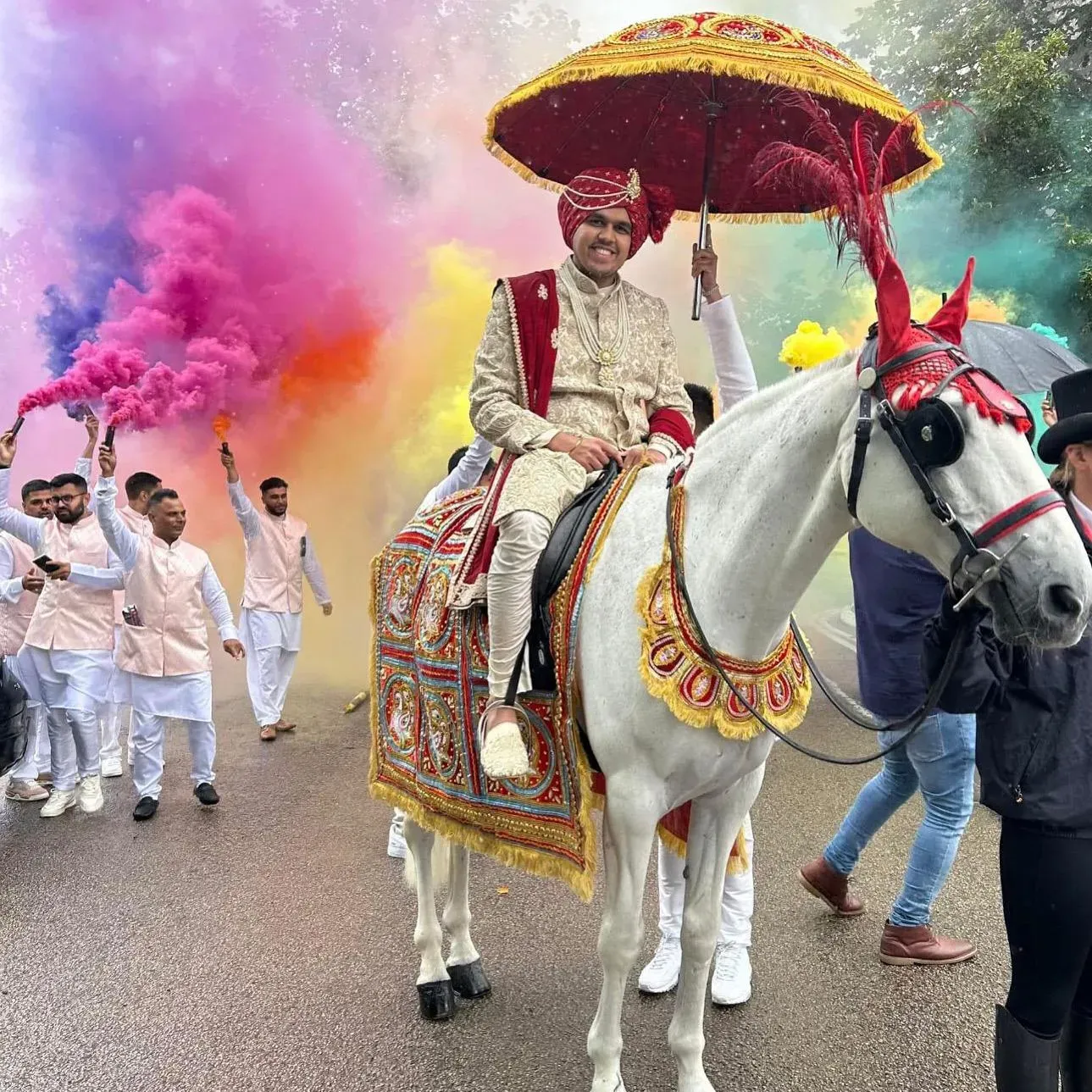 Groom arriving on a decorated wedding horse