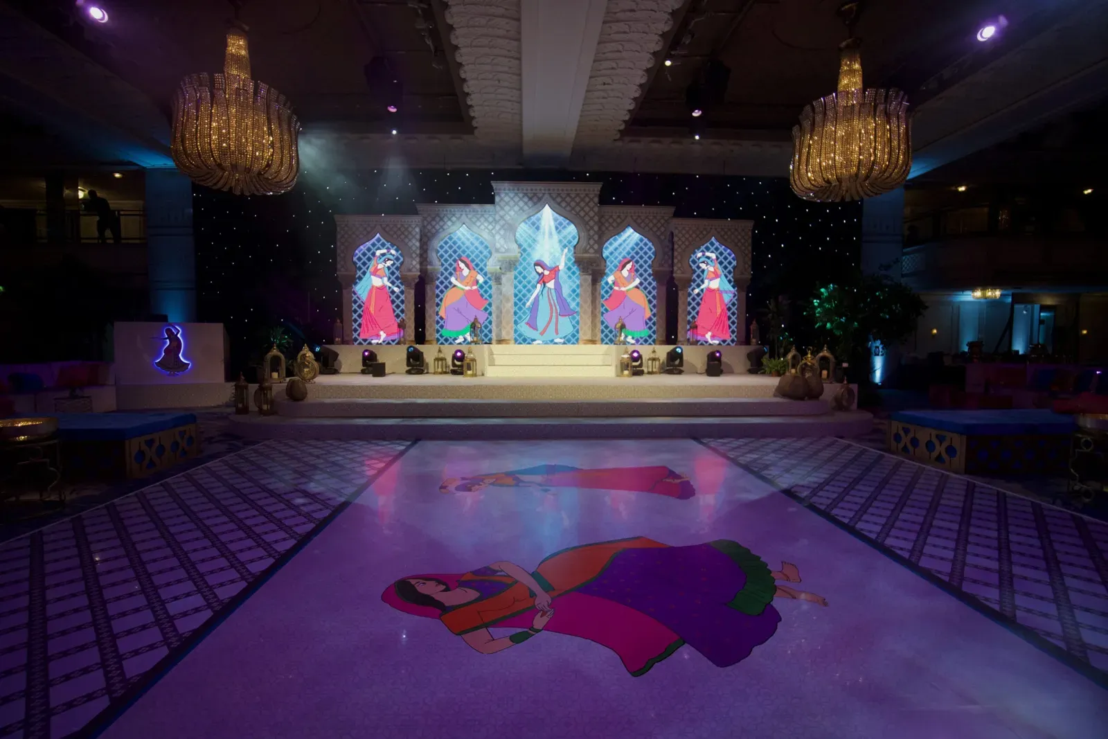 Ballroom set with LED screens, a stage and a printed dance floor at Grosvenor House
