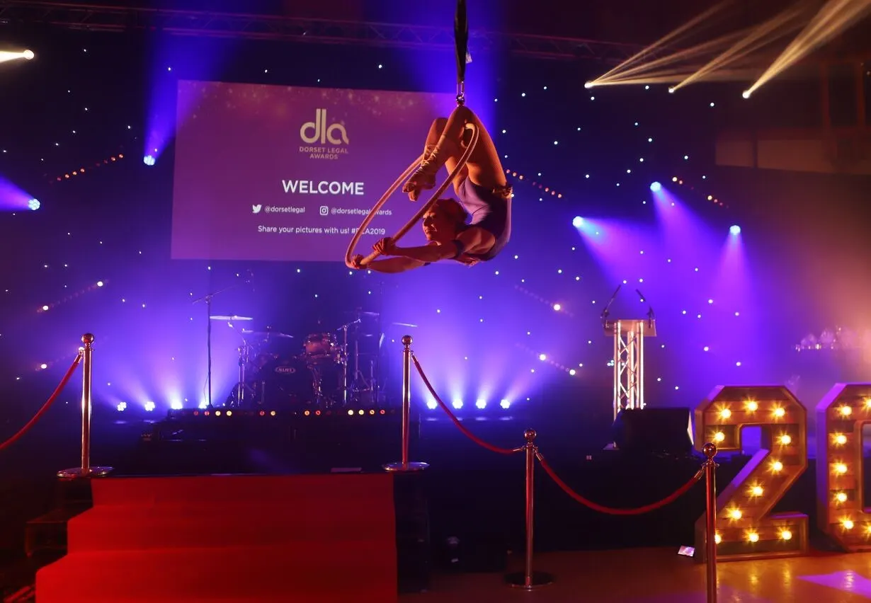 Dorset Legal Awards aerial hoop: aerial performers, circus showman theme