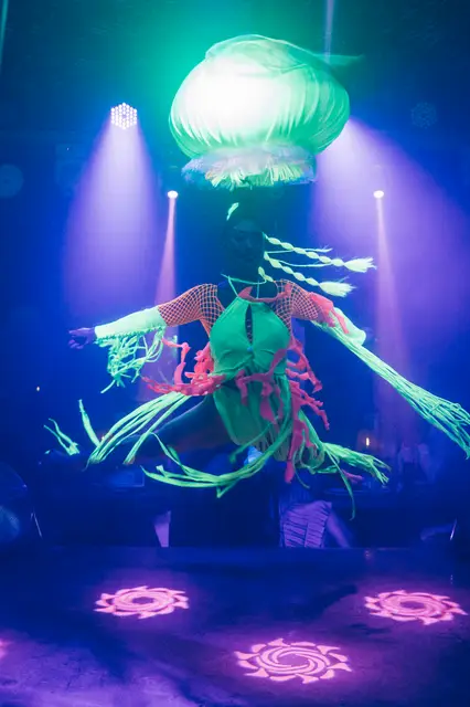 UV neon jellyfish hair hang aerialist: aerial performers, under the sea theme