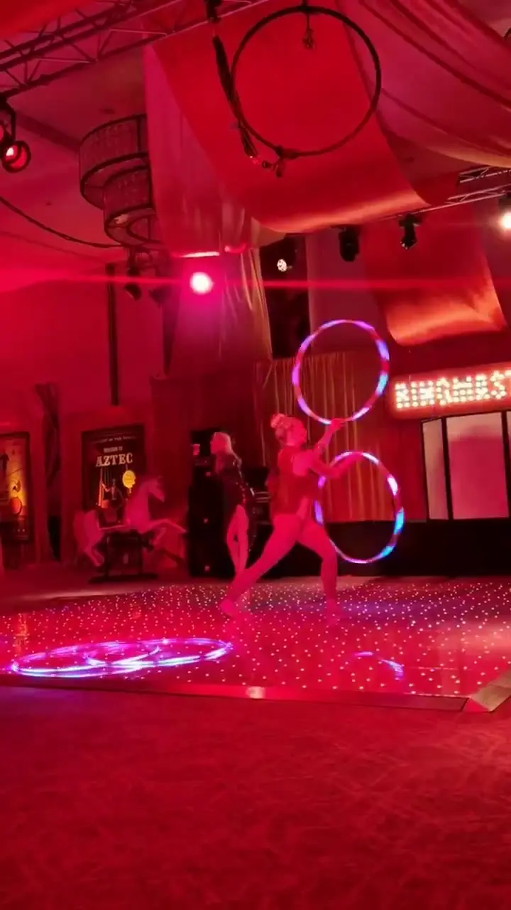 Hula hooper performs with live singer, Devizes