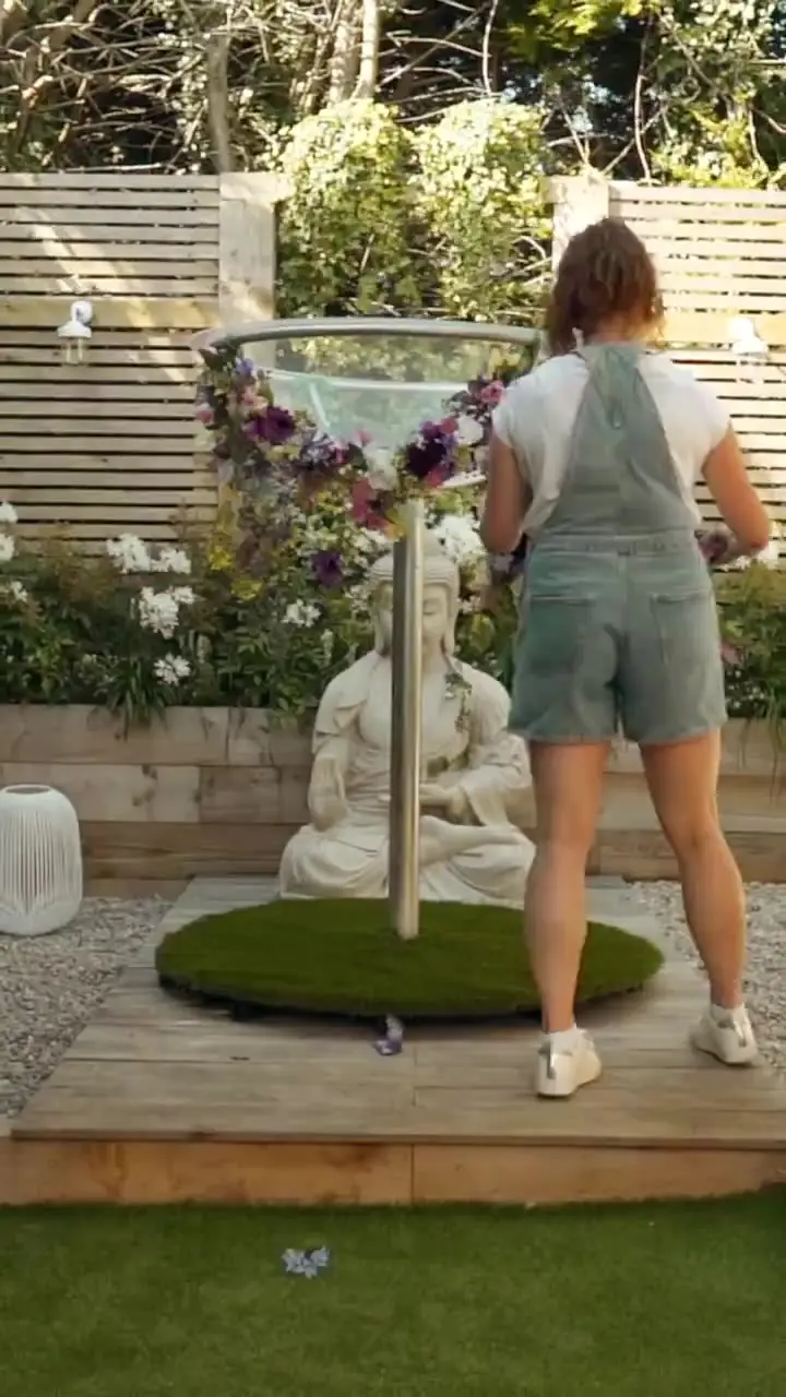 Prop set up: giant martini glass, enchanted garden theme