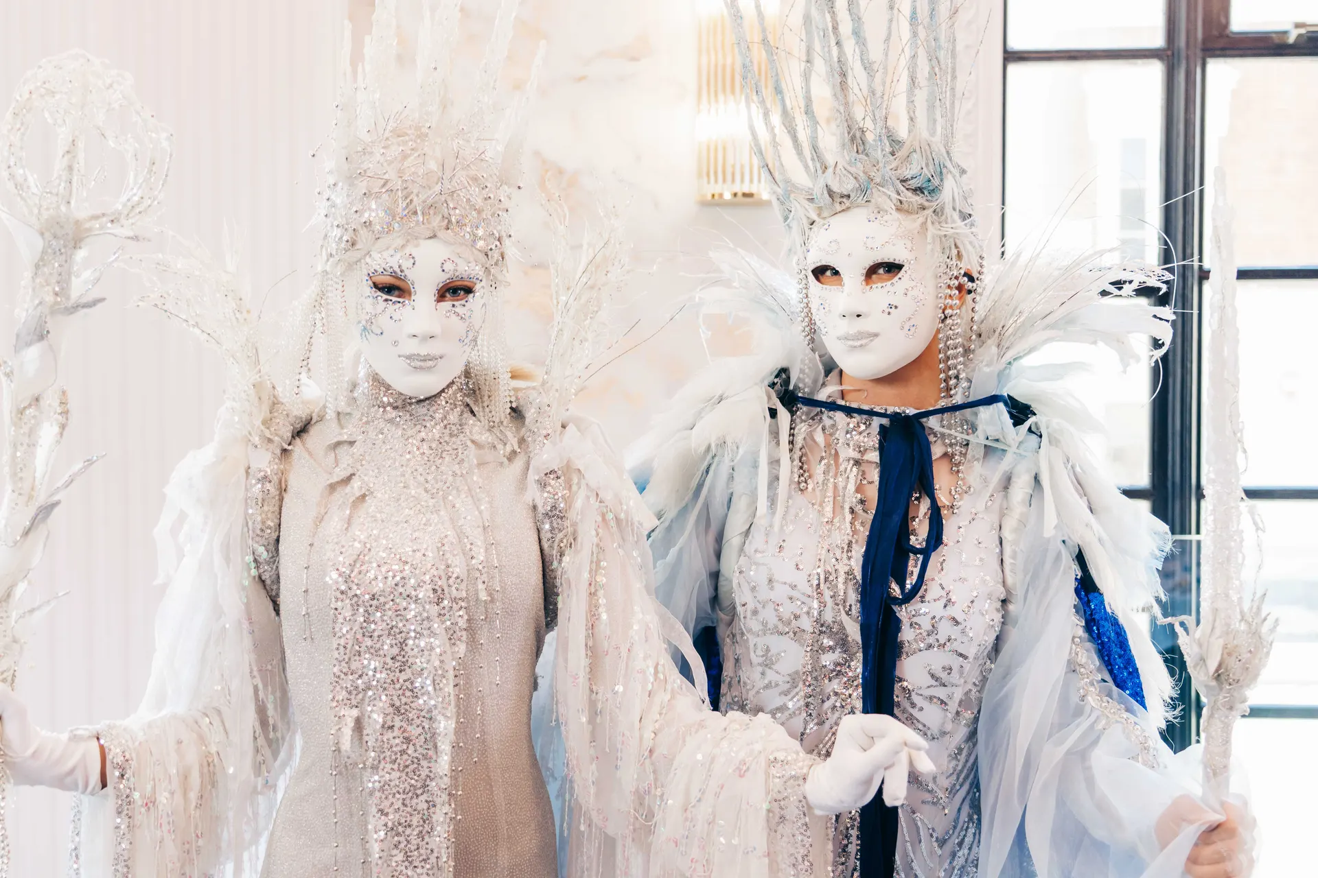 Pair: living statues, winter wonderland theme