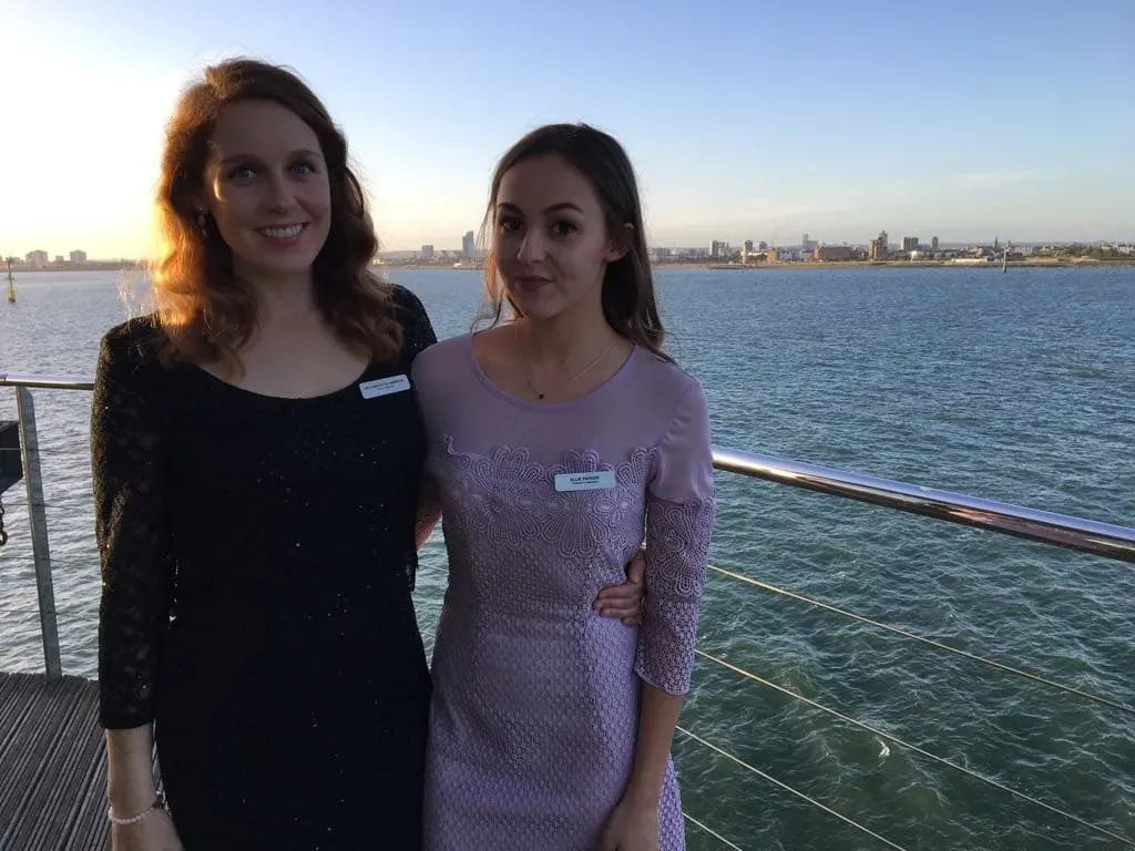 Event hosts at a waterside venue
